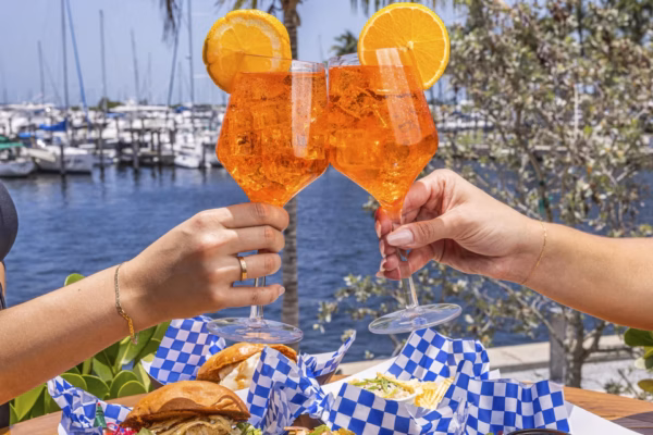 Toasting cocktails by the waterfront