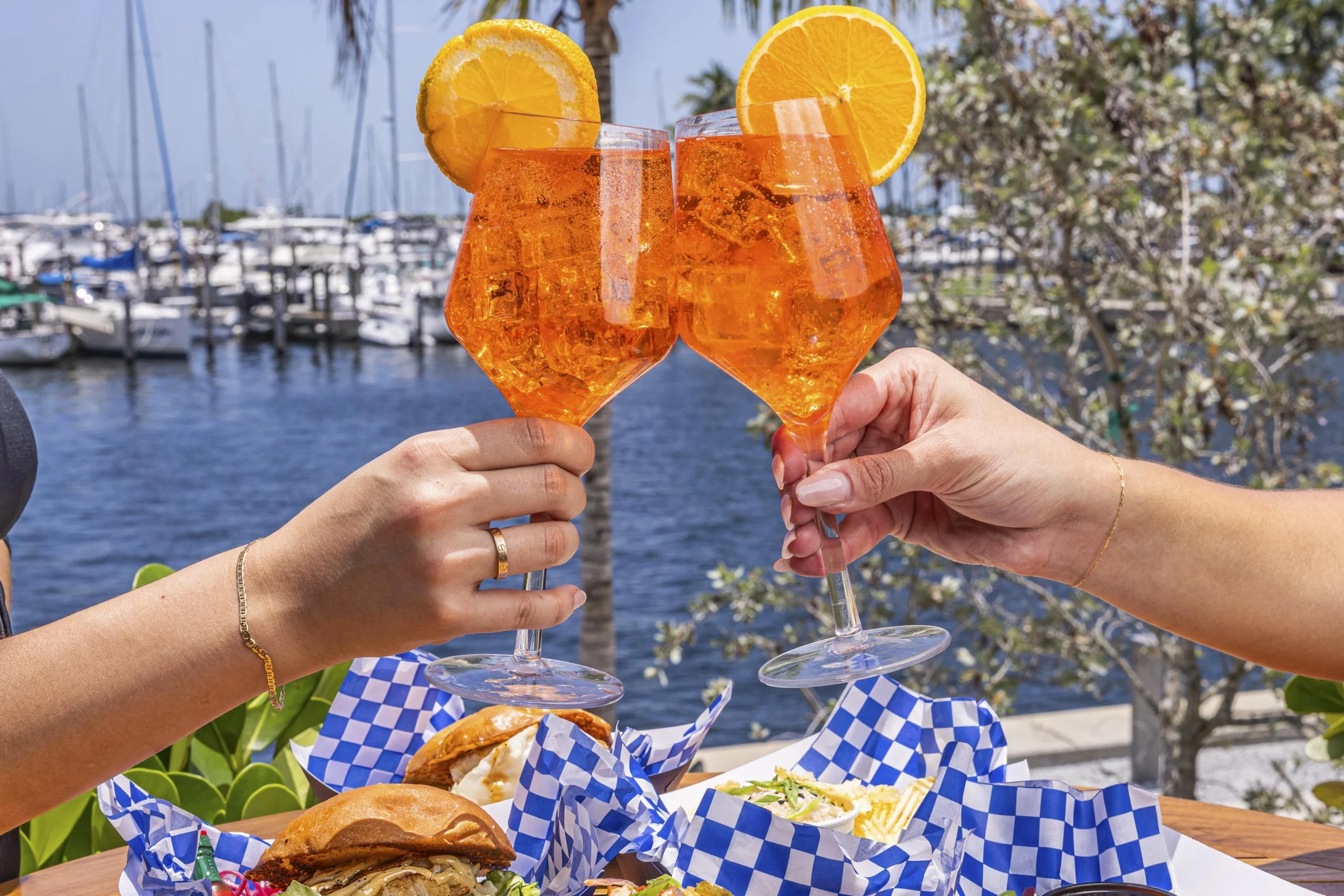 Toasting cocktails by the waterfront
